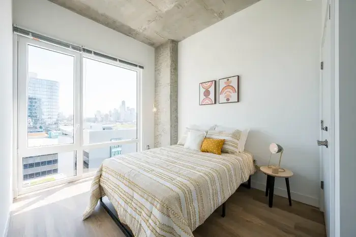 Co-living bedroom at Post Chicago Apartments, Lincoln Park furnished apartments.