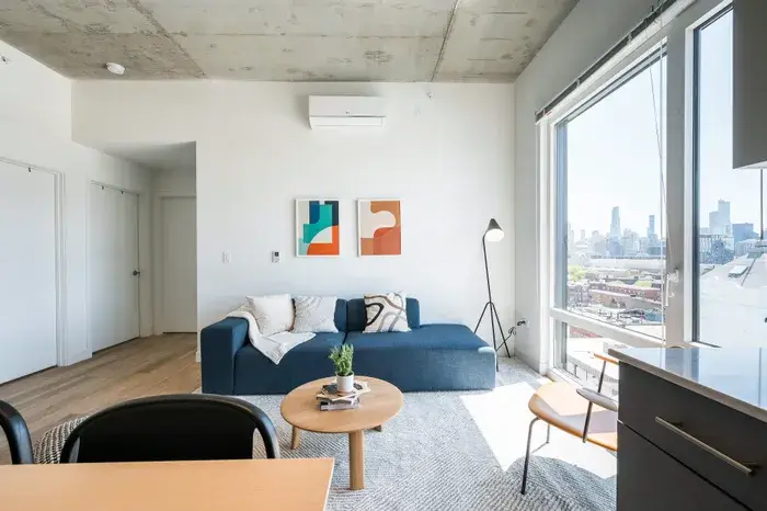 Modern living room at Post Chicago Apartments - Co-living apartments in Chicago