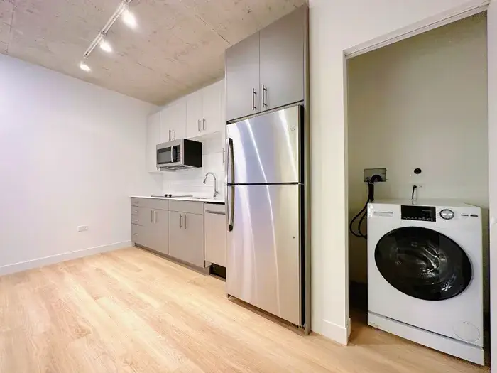 Kitchen and laundry at Post Chicago Apartments, Lincoln Park furnished apartments.