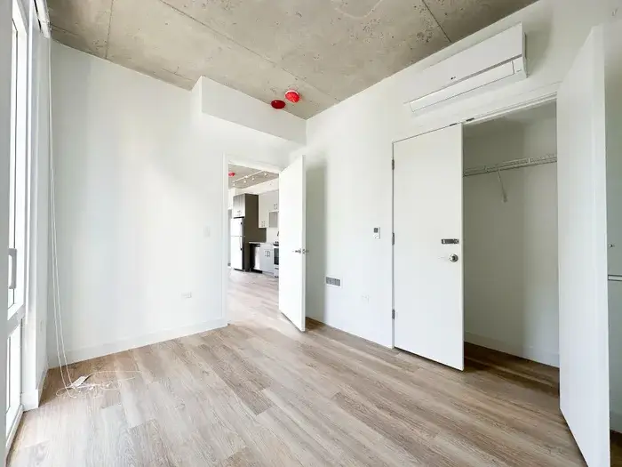 Bedroom at at Post Chicago Apartments, Lincoln Park furnished apartments.